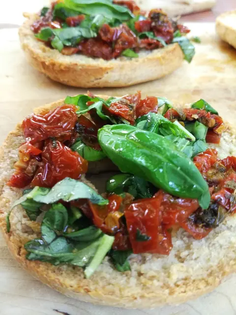 Finished Bruschetta al Pomodoro served on a table.