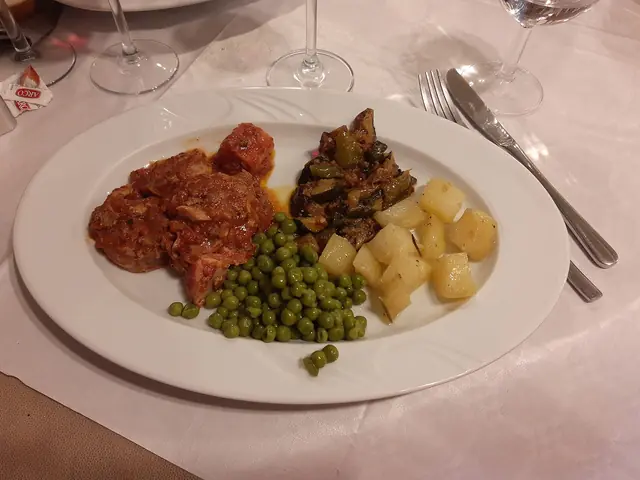 Finished Italian dish Osso Buco served on a plate.