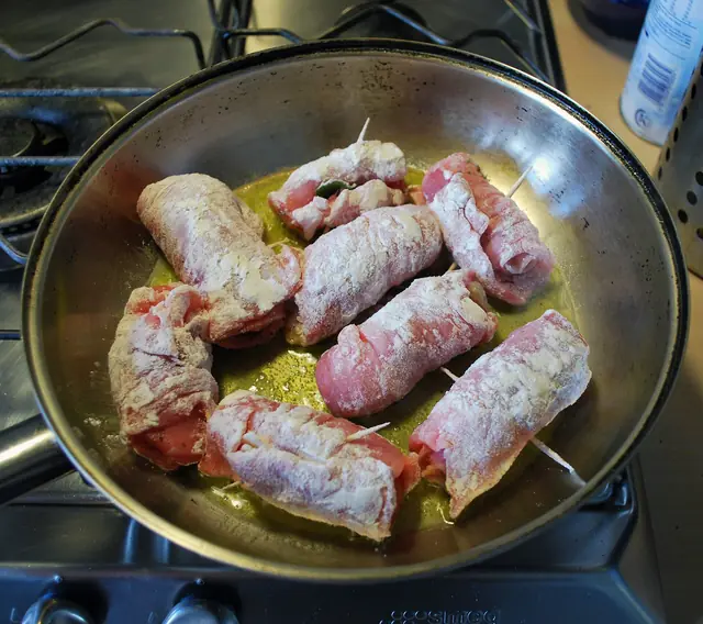 Finished Italian dish Saltimbocca alla Romana served on a plate.