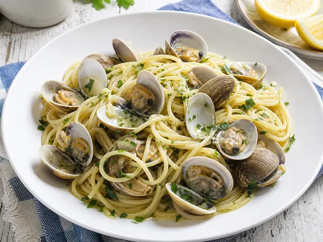Finished Italian dish Spaghetti alle Vongole served for the recipe page.